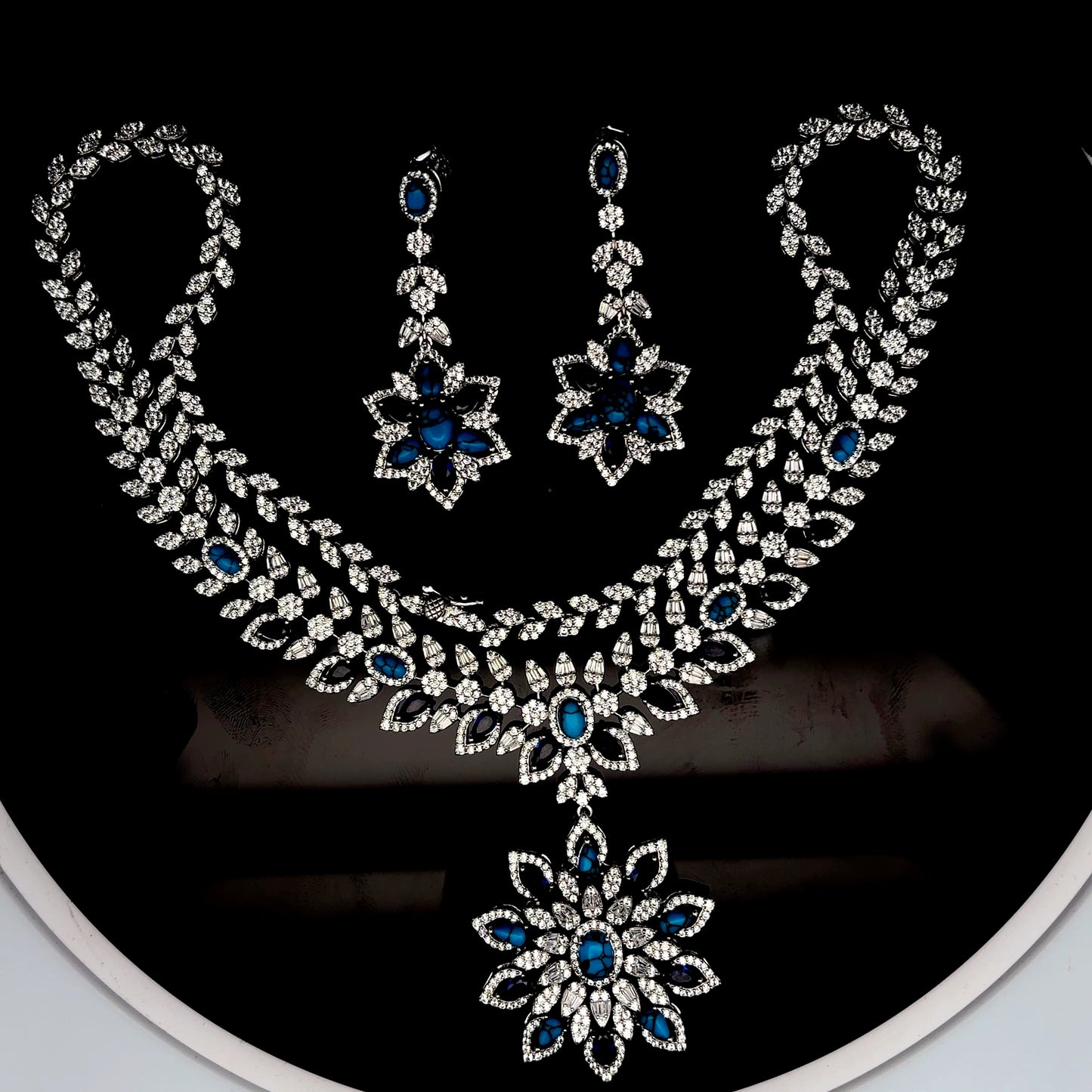 Sterling Silver Necklace with Earrings Inlaid with Blue American Diamonds