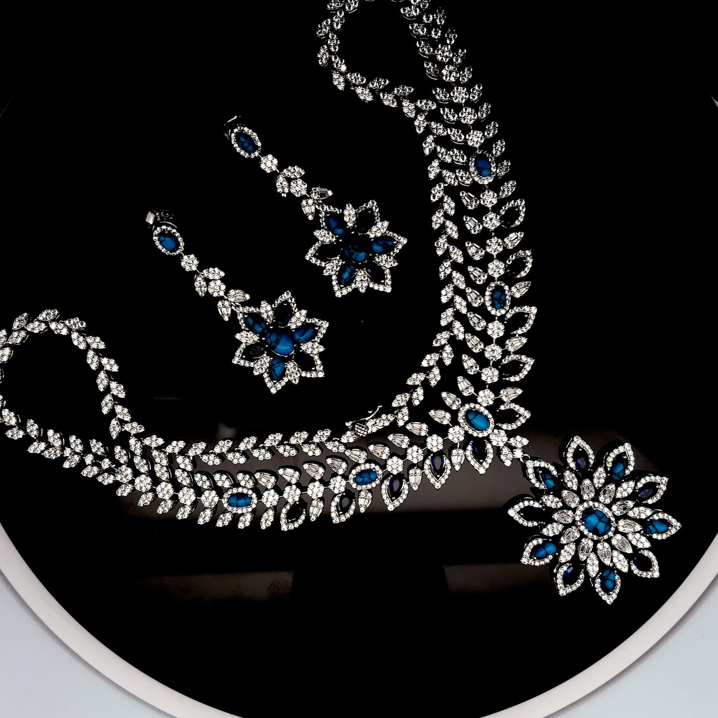 Sterling Silver Necklace with Earrings Inlaid with Blue American Diamonds