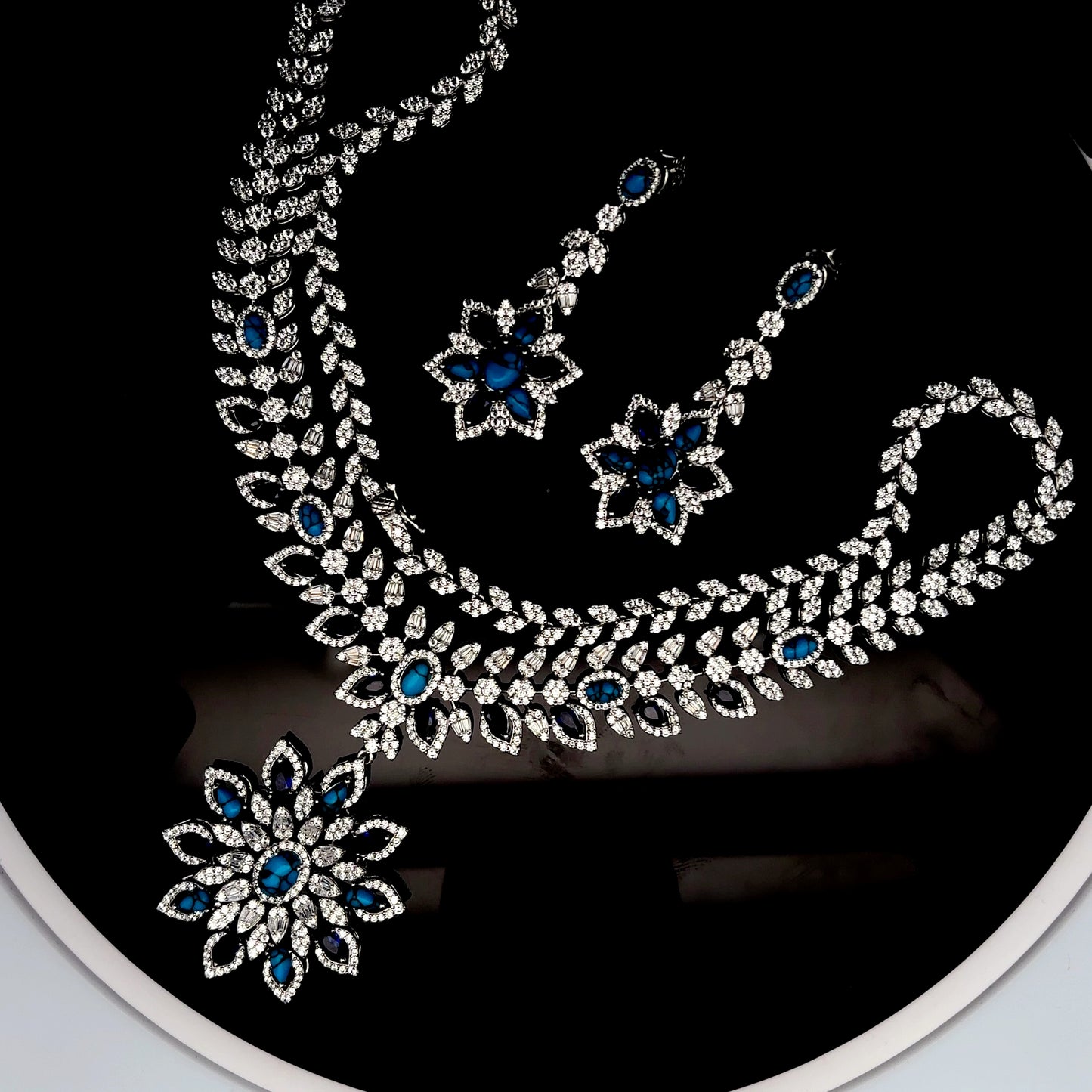 Sterling Silver Necklace with Earrings Inlaid with Blue American Diamonds